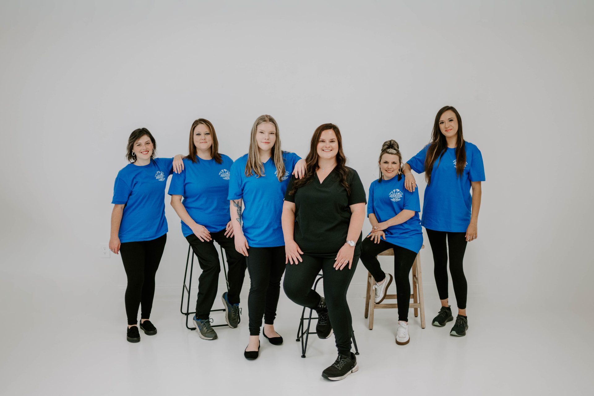 The cleaning team in blue uniform shirts